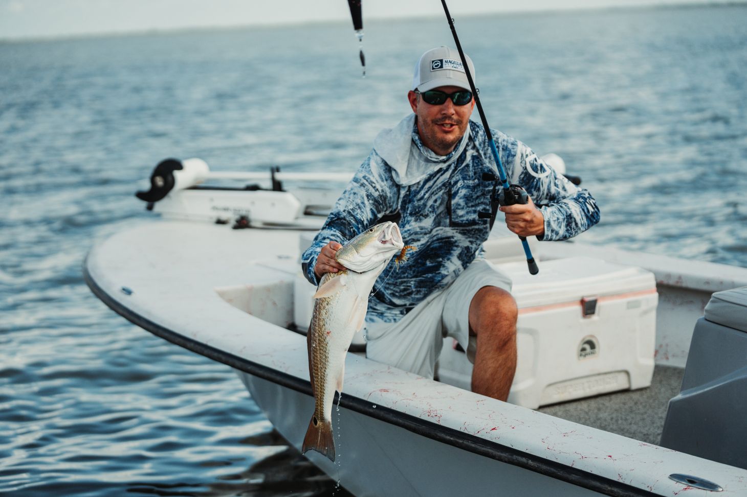 angler catches redfish
