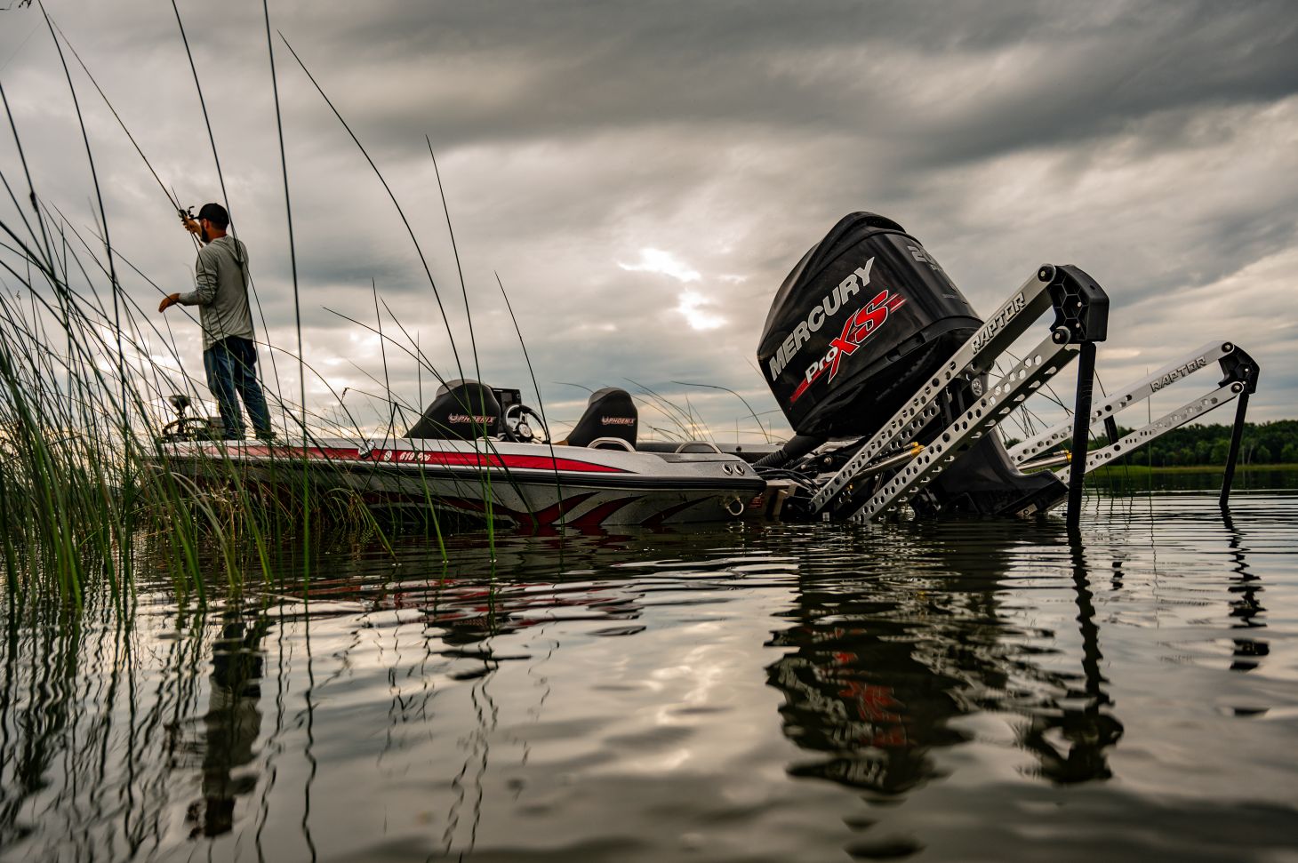 Angler making a cast off a bass boat