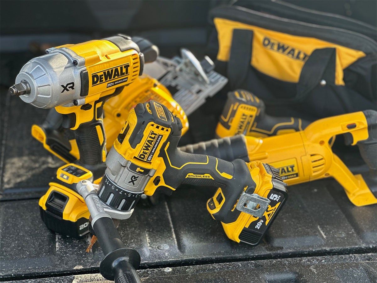 Dewalt powertools in the bed of a Honda Pioneer during testing