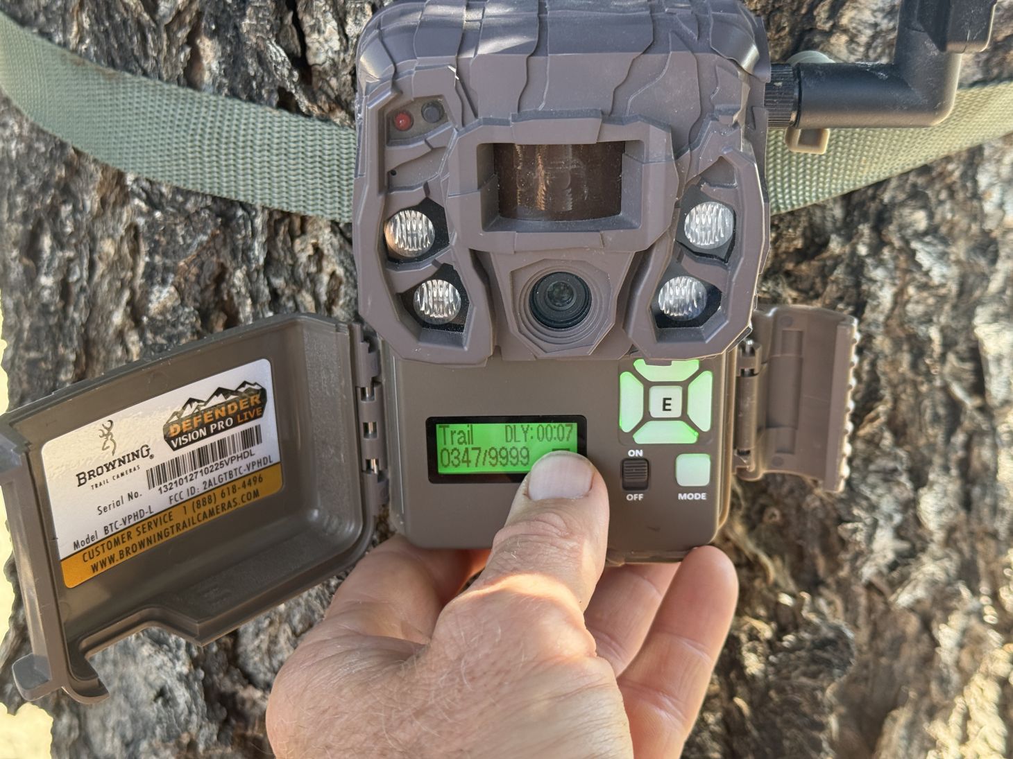 A person set up a Browning Defender Vision Pro LiveStream cell camera on a tree. 