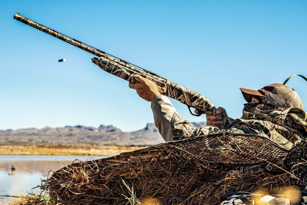 The author pops out of his blind and drops a duck near Roswell.