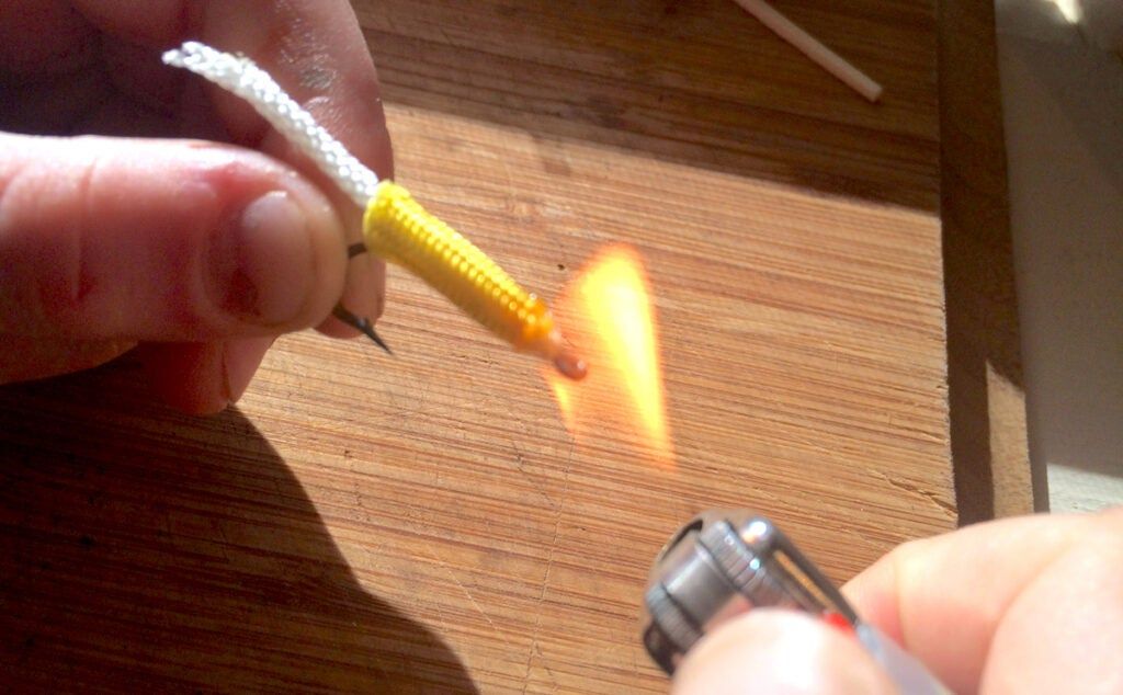 A lighter comes in handy when making a survival lure from paracord. 