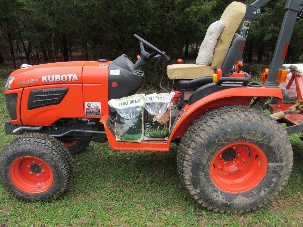 A yard-tilling tractor with seeds.