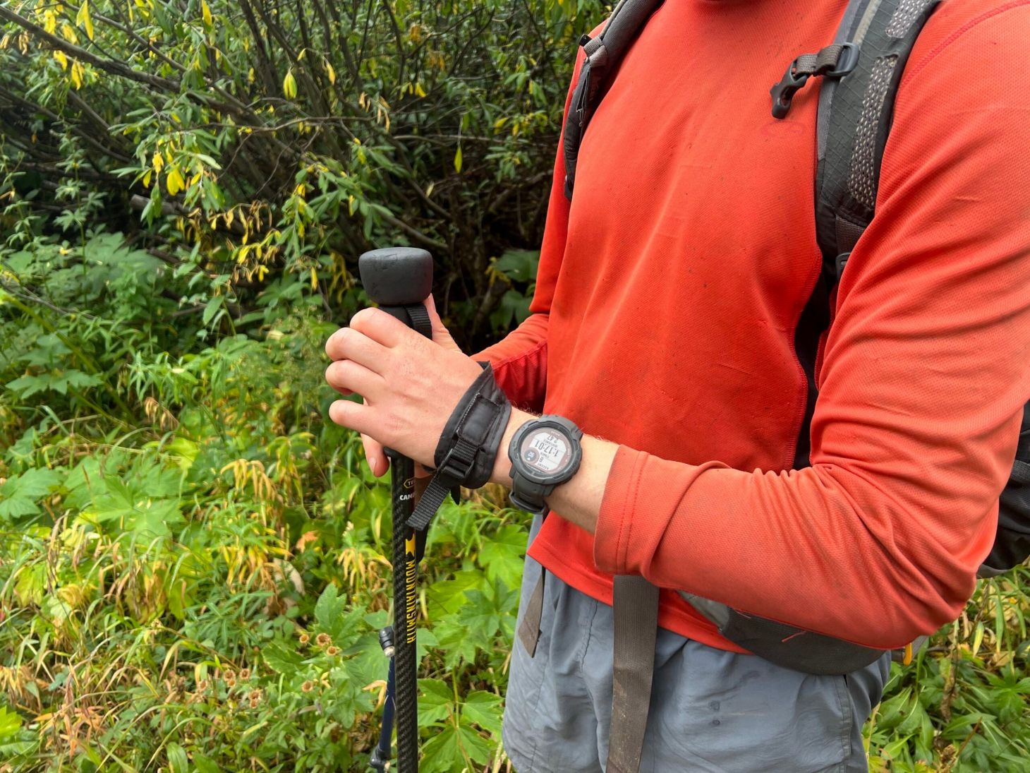 Hiker wearing Garmin Instinct 2 GPS Watch