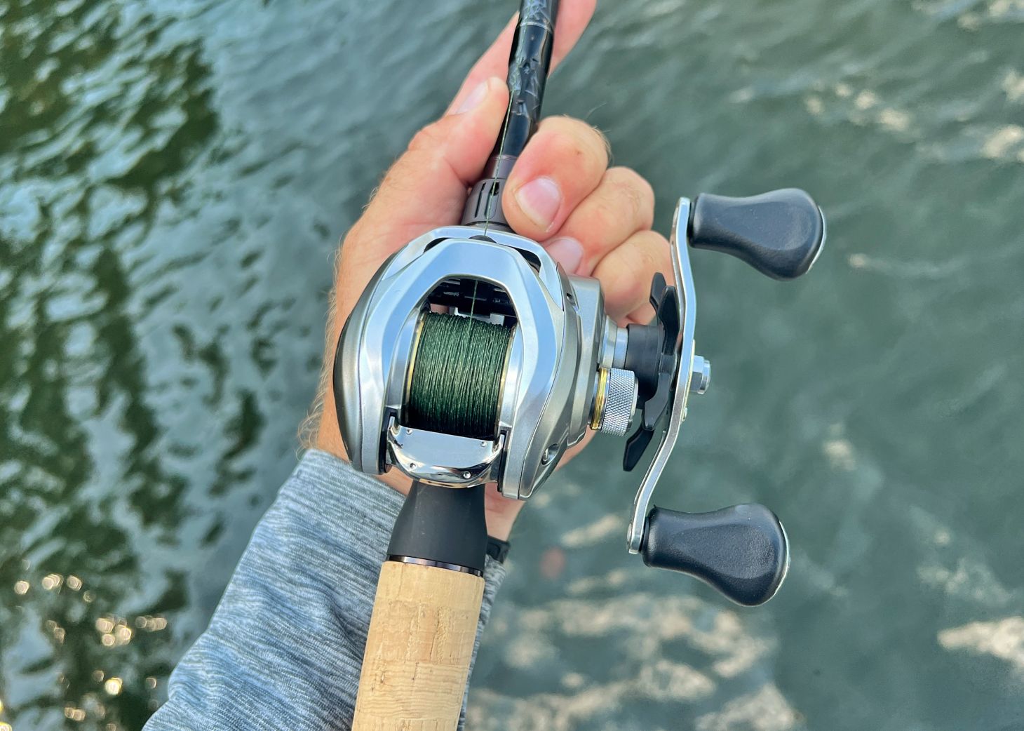 Daiwa Aird 80H casting reel in hand