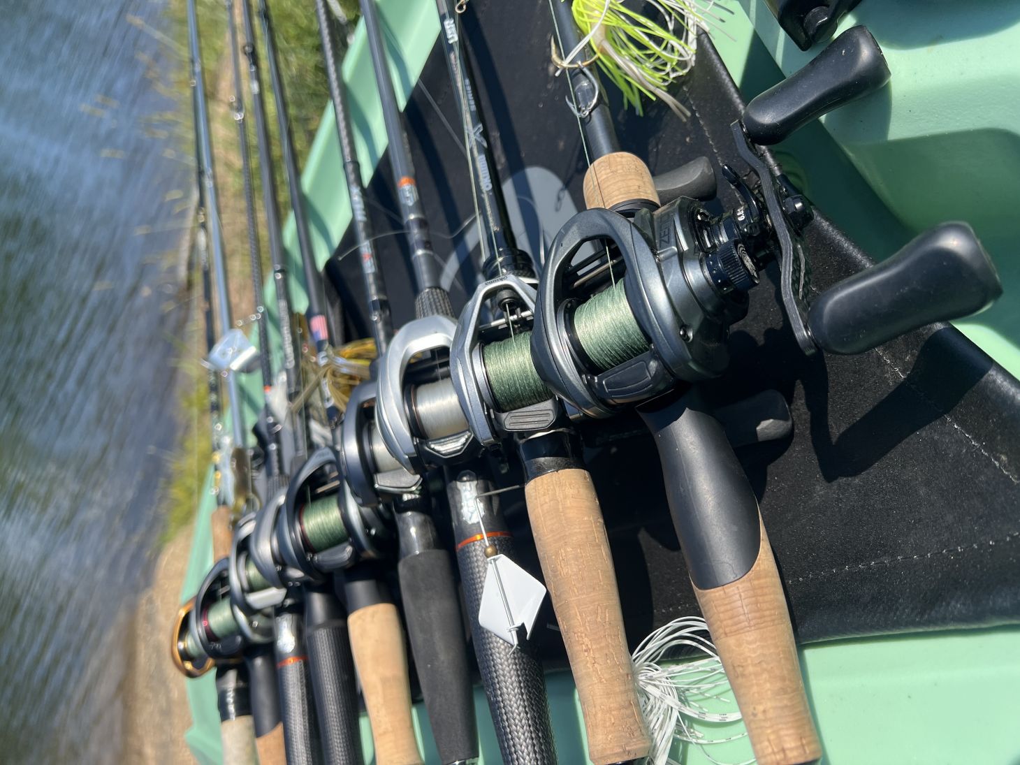 Fishing rods and reels on boat deck