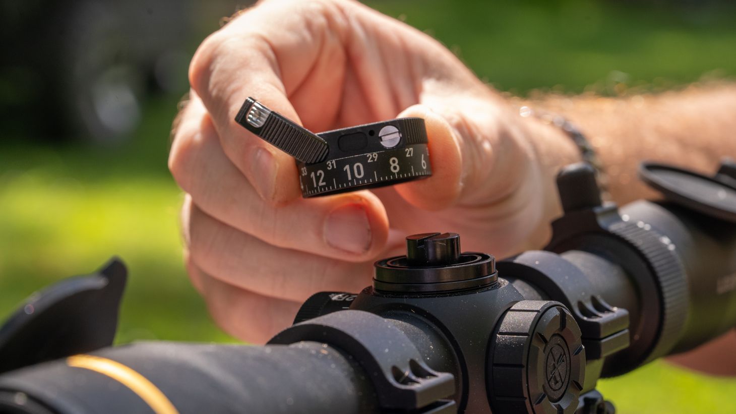The removable custom dial on a Leupold scope. 