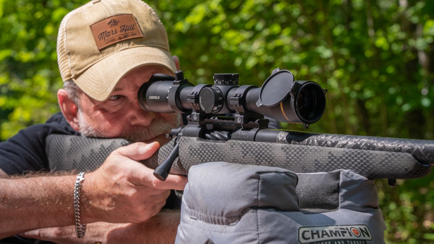 A shooter test a rifle with the new Leupold VX-6HD Gen 2 2-12x42 riflescope on it.