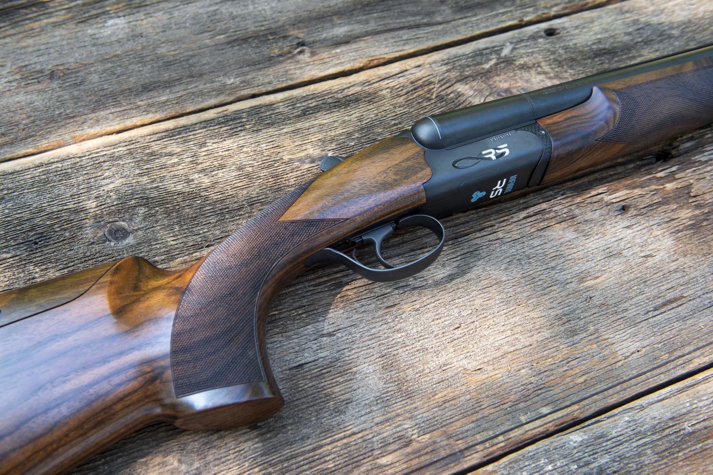 Fabarm Infinite RS shotgun on barn boards. 