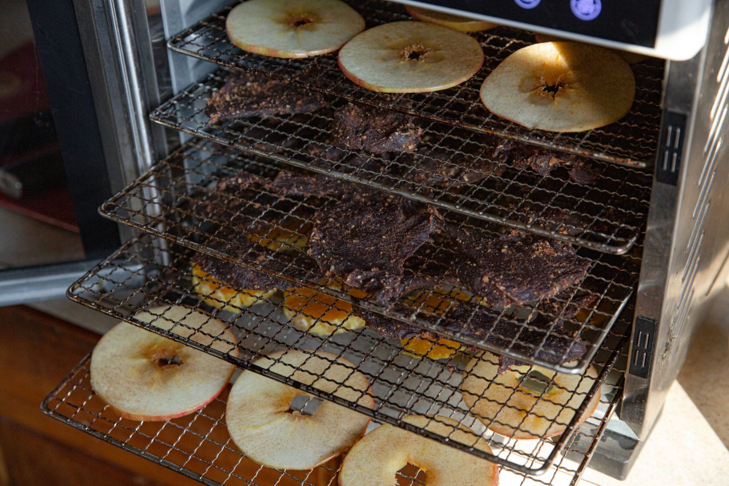 Photo of dehydrated jerky and fruits