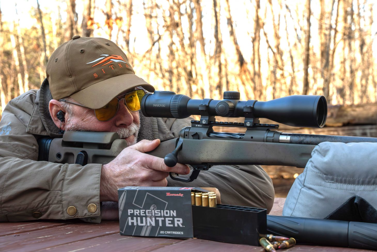 The shooter fires the new Savage 110 PPR rifle from a bench rest. 