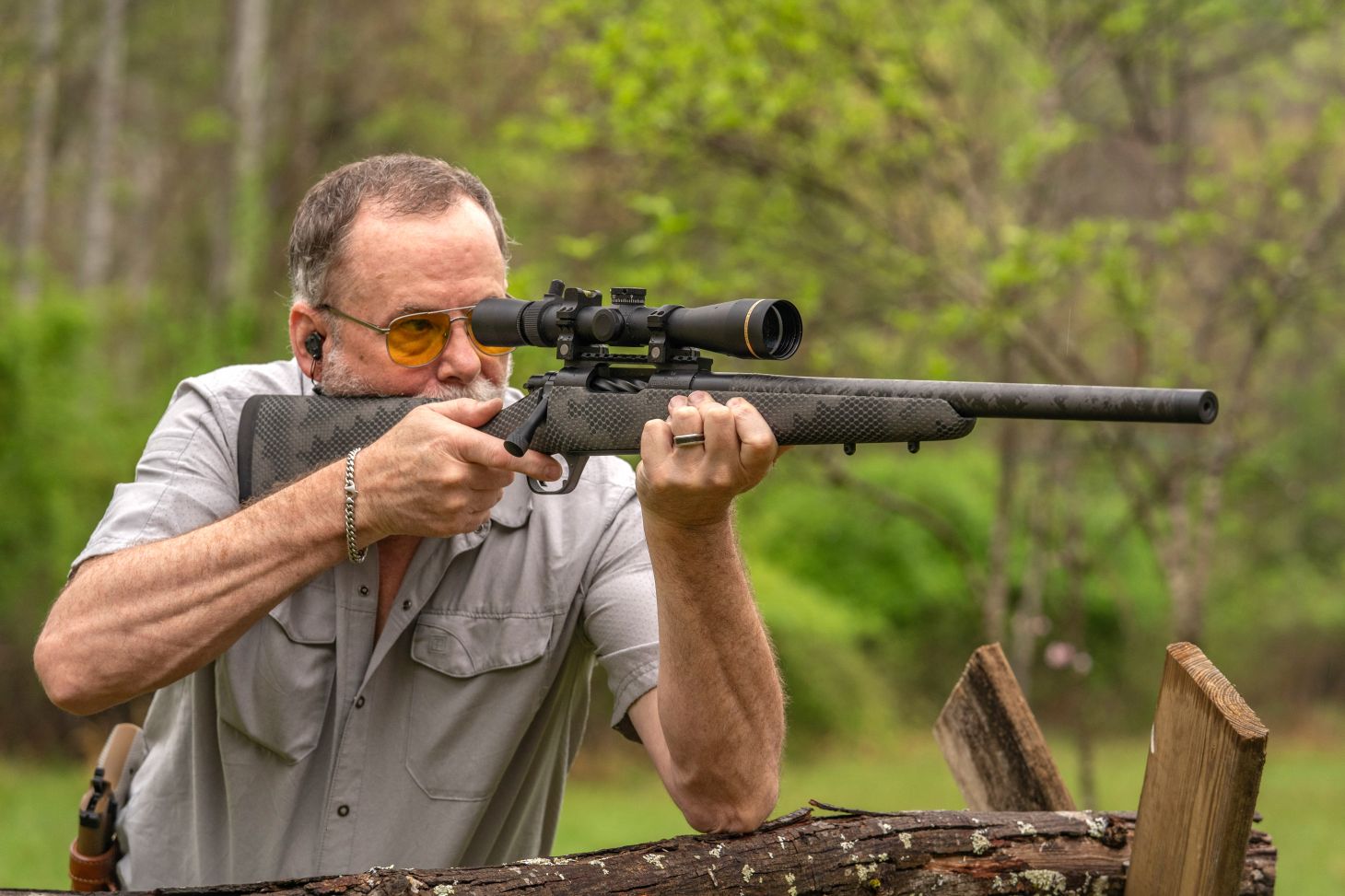A shooter fires the new Proof Research Glacier Ti from a barricade. 