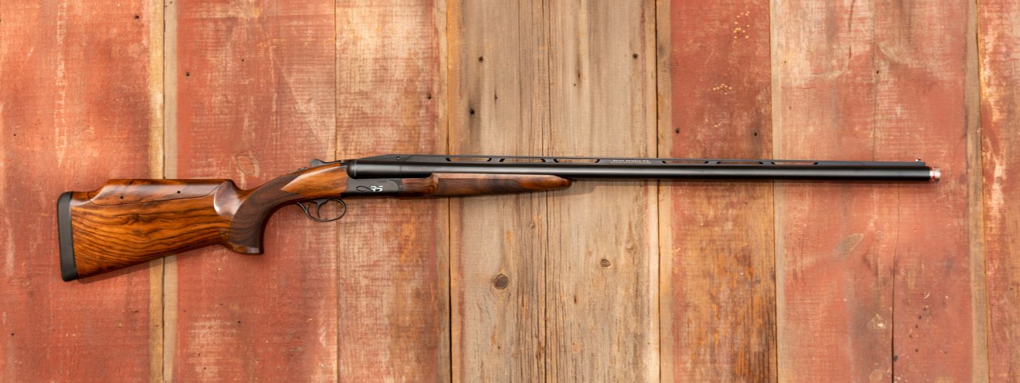 Fabarm Infinite RS shotgun on a barn-board background. 