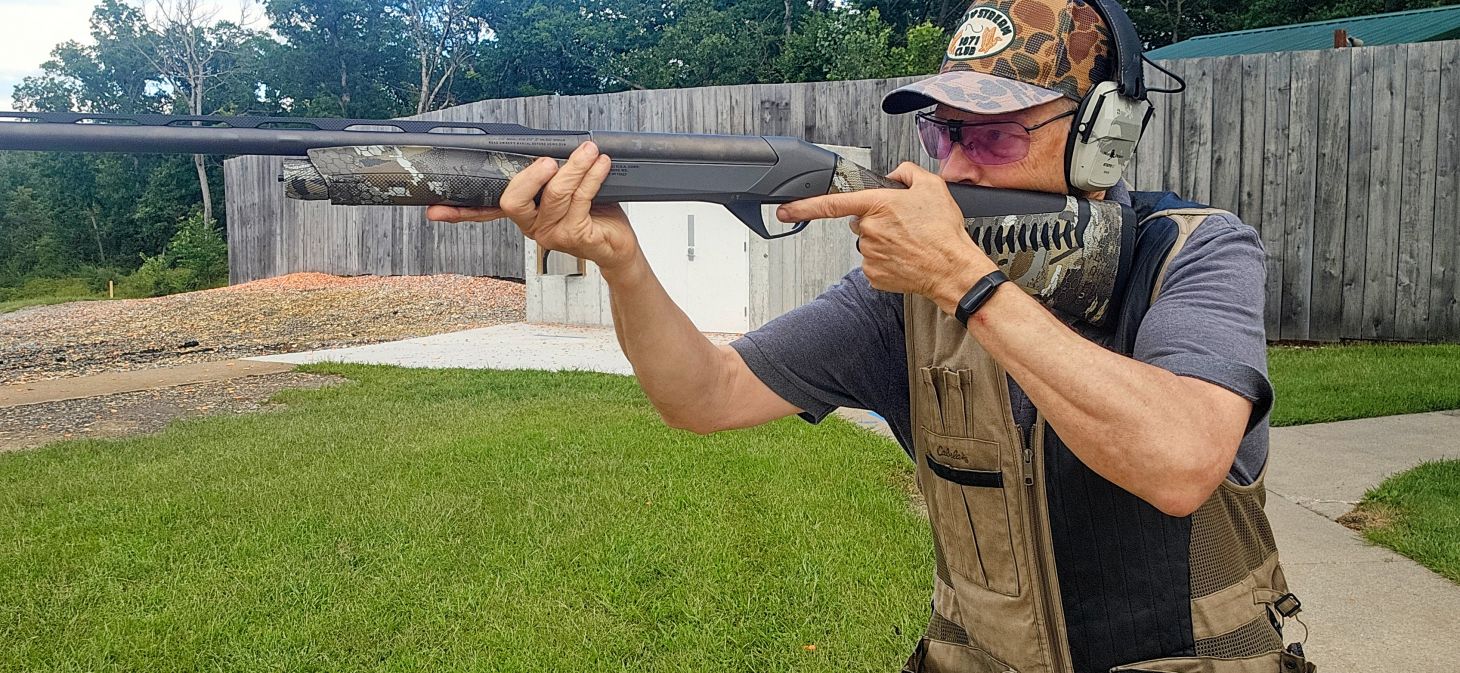 A shooter test the new Benelli SBE 3 A.I. BES.T. shogun on the range. 