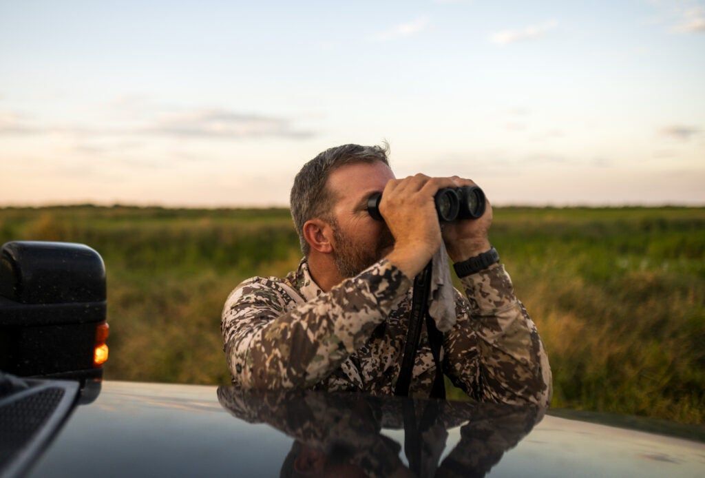 duck hunter scouting for ducks
