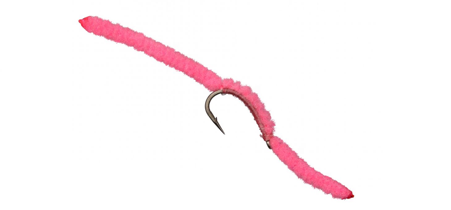 A San Juan Worm fly on a white background. 