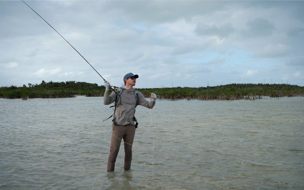 Angler casting Sage Salt R8 fly rod in Bahamas