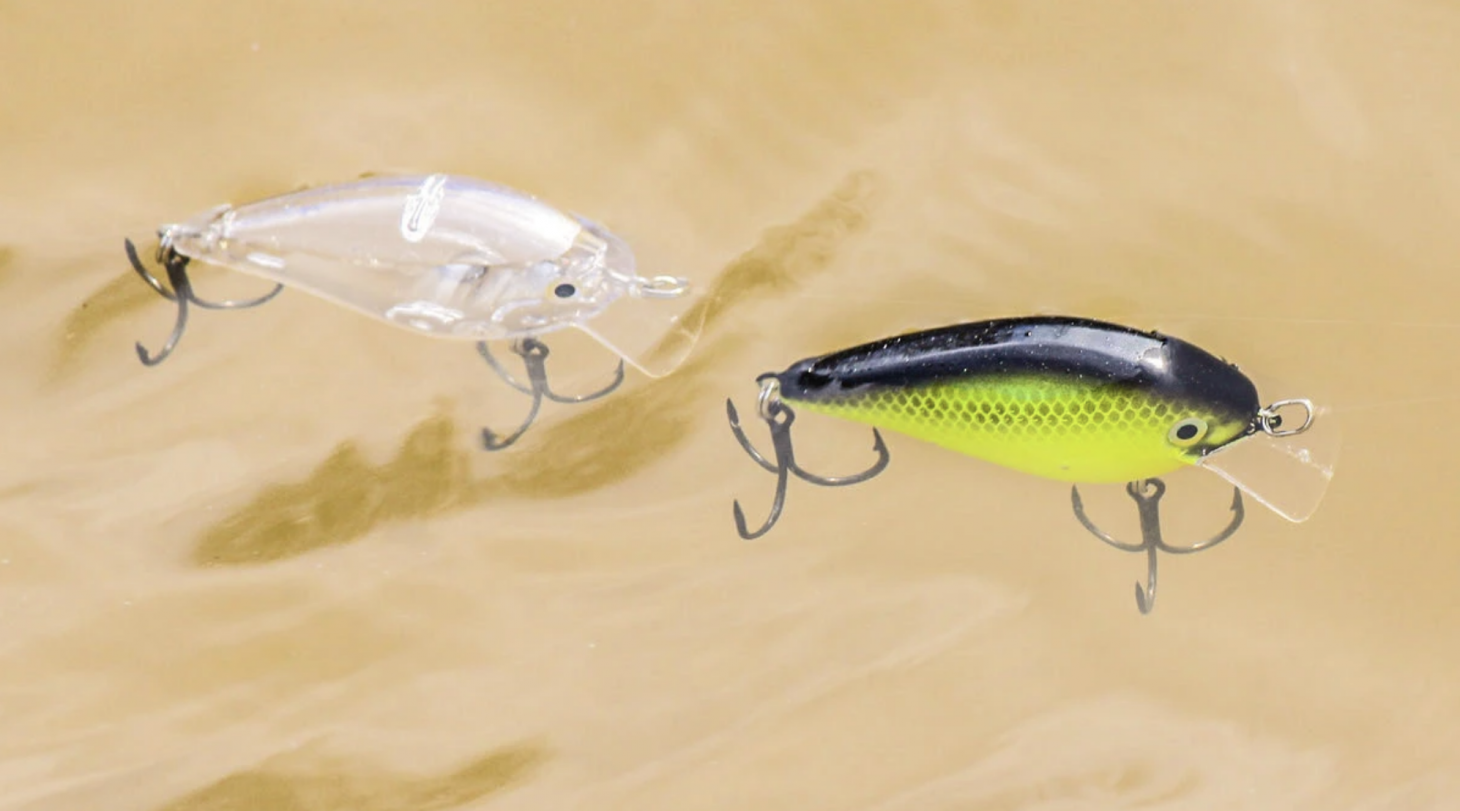 Two crankbaits in muddy water