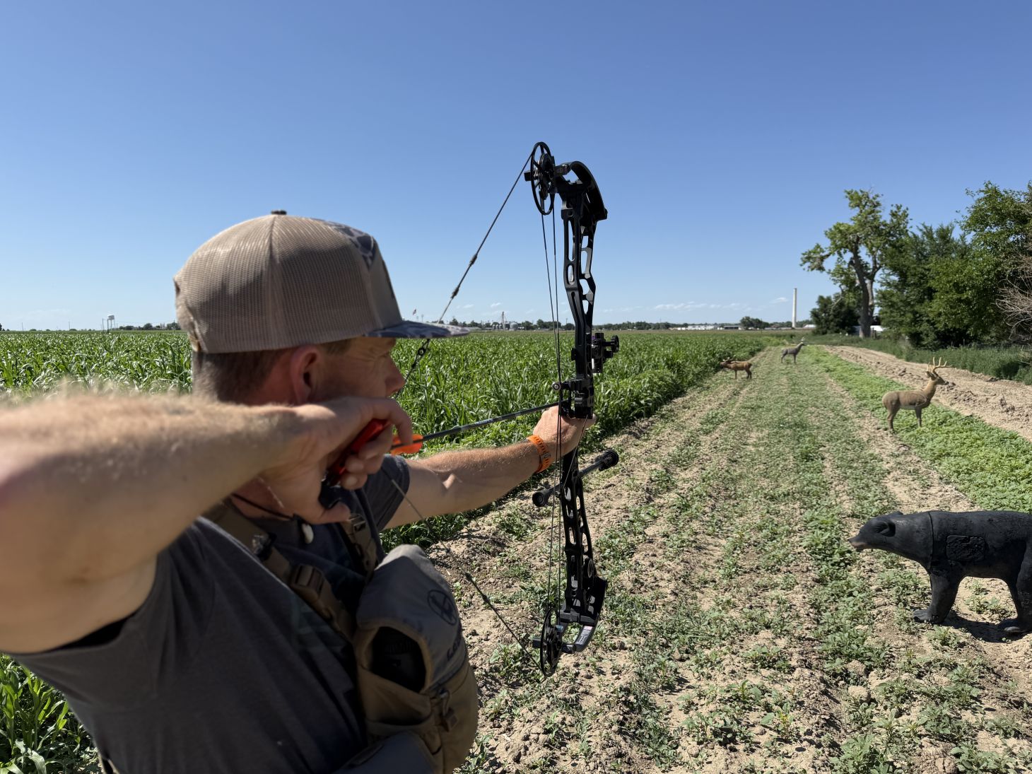 An archer shoots the new Bowtech Proven 34 on an outdoor range. 