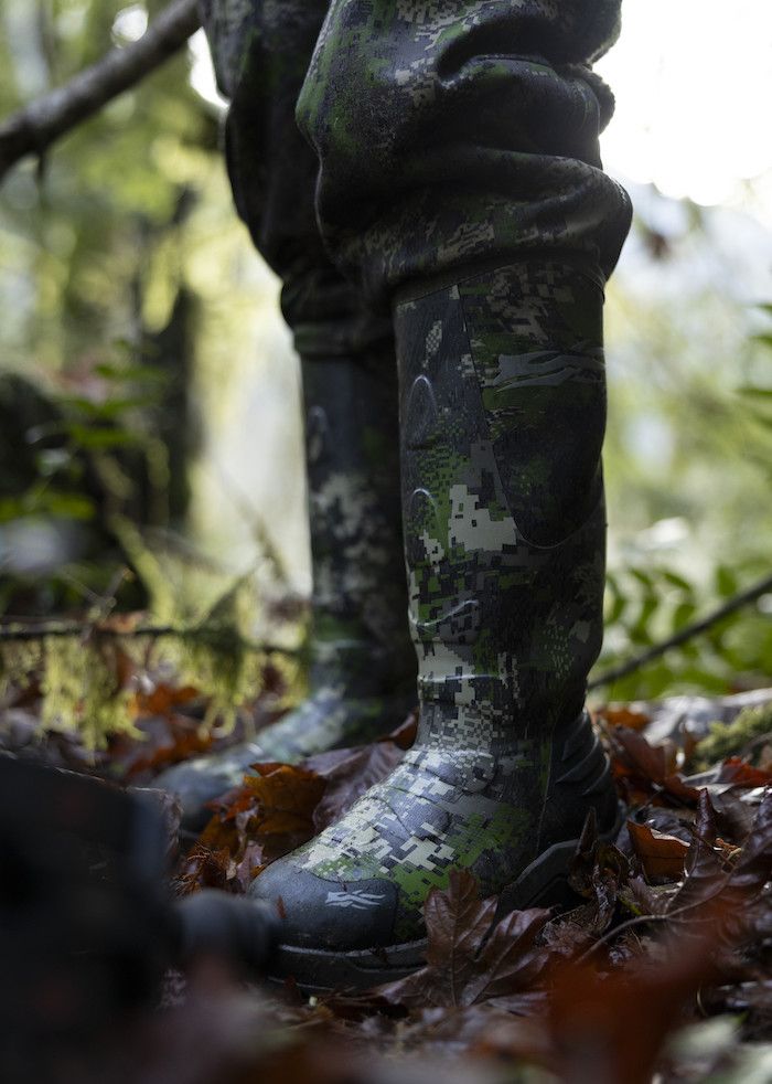 Hunter wearing Sitka Back40 Boots in Optifade Cover