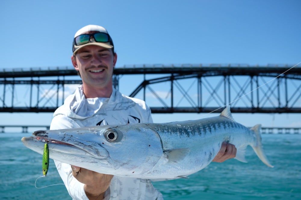 Angler wearing Smith Optics Hookset sunglasses fishing for tarpon