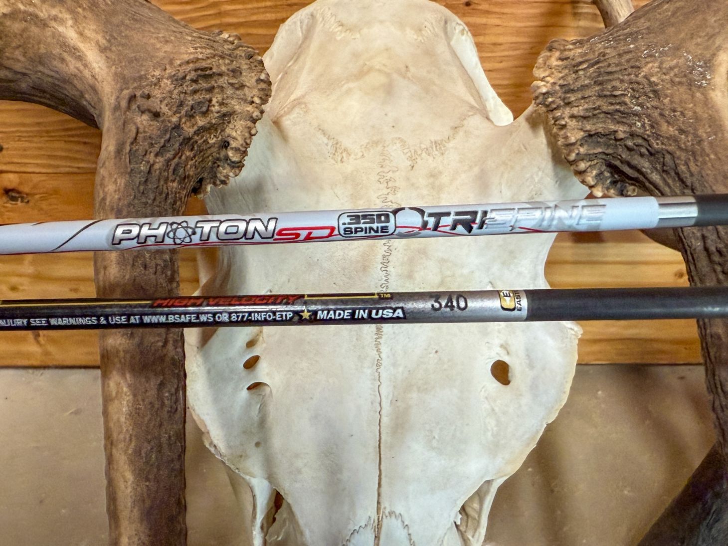 Two arrows showing spine ratings of 350 and 340.