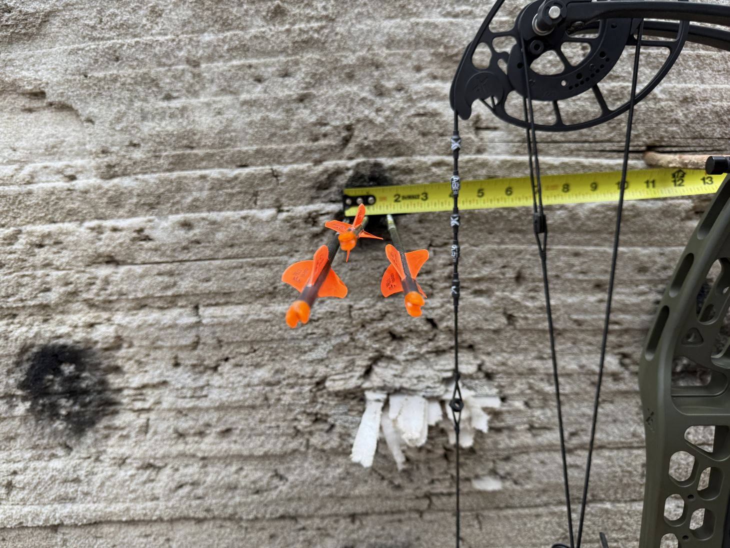 A sub-2-inch group of arrows shot with the new Xpedition XLite 32 bow. 