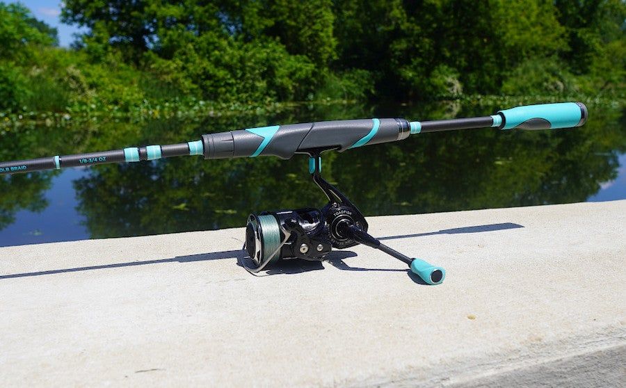 Toadfish Inshore Spinning Combo sitting on boat