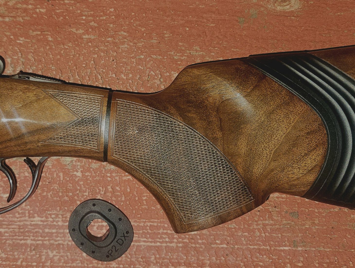 Close up photo of the Beretta Ultraleggero Kick-Off shotgun's stock shim.