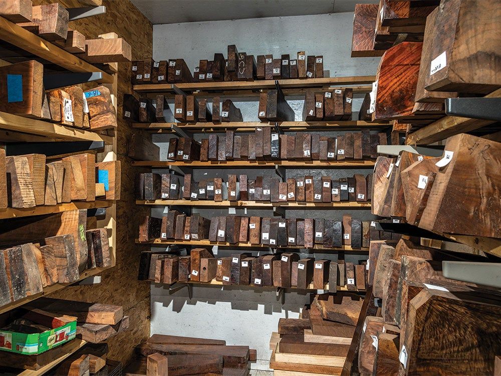 a storage room full of wooden blocks used for rifle stocks