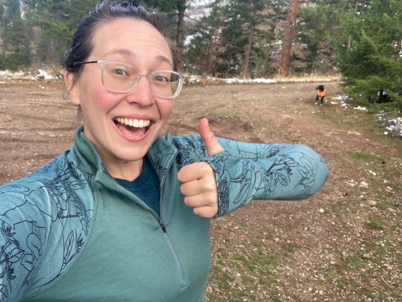 Female hiker wearing Wild Rye Hailey Half-Zip Base Layer