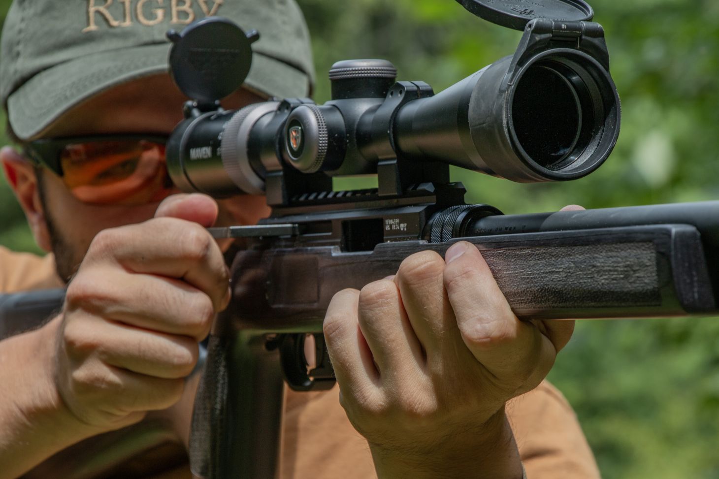 A shooter fires the new Hammerli Arms Force B1 rimfire rifle at an outdoor range.