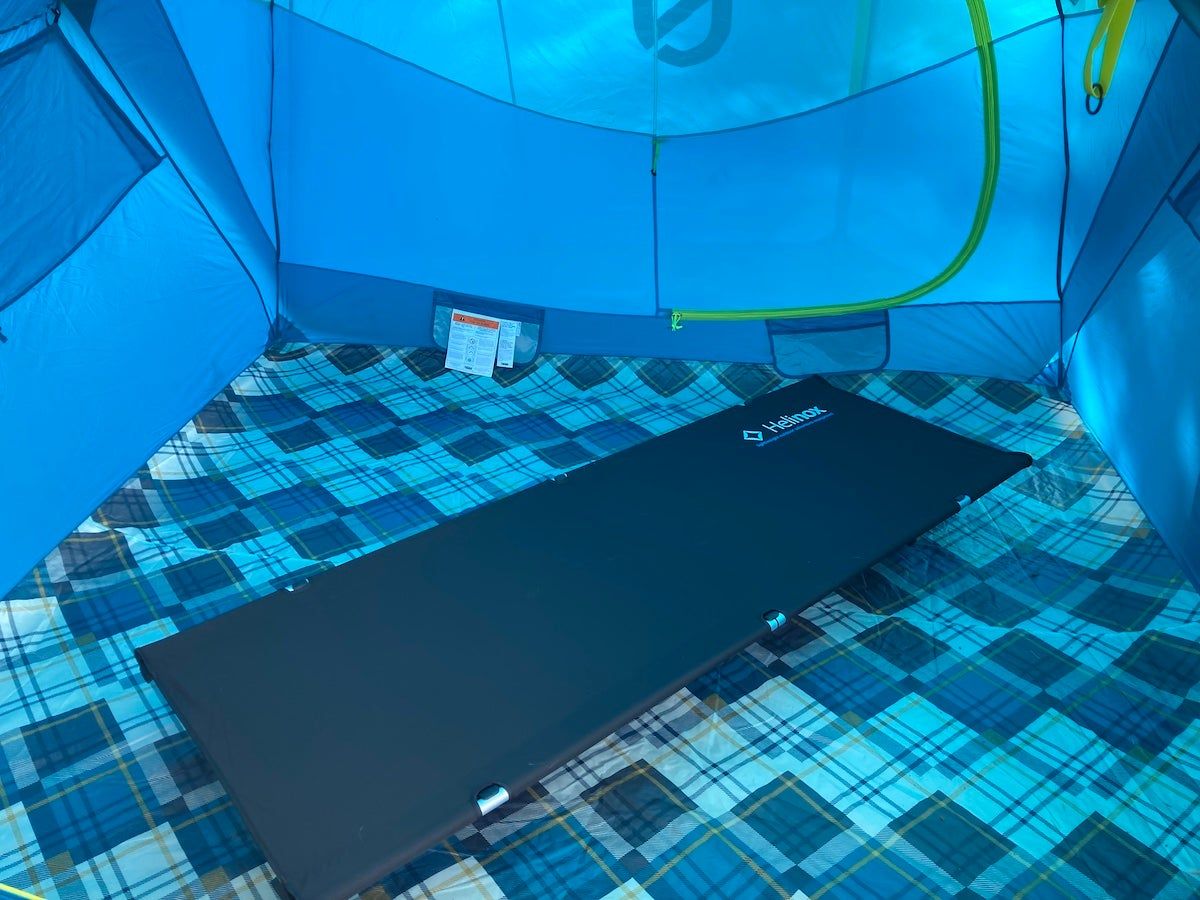 Helinox Cot One Convertible set up in camping tent during testing