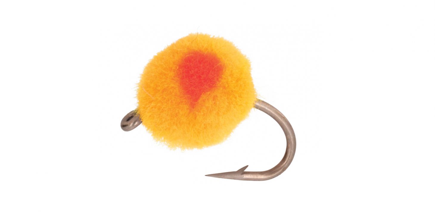 A Salmon Egg fly on a white background. 