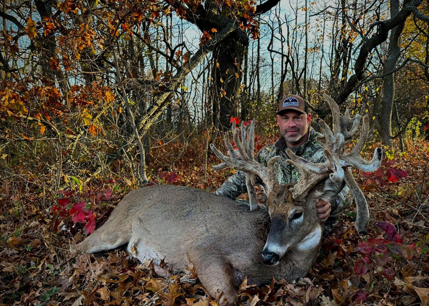 An Indiana hunter poses with a trophy buck. 