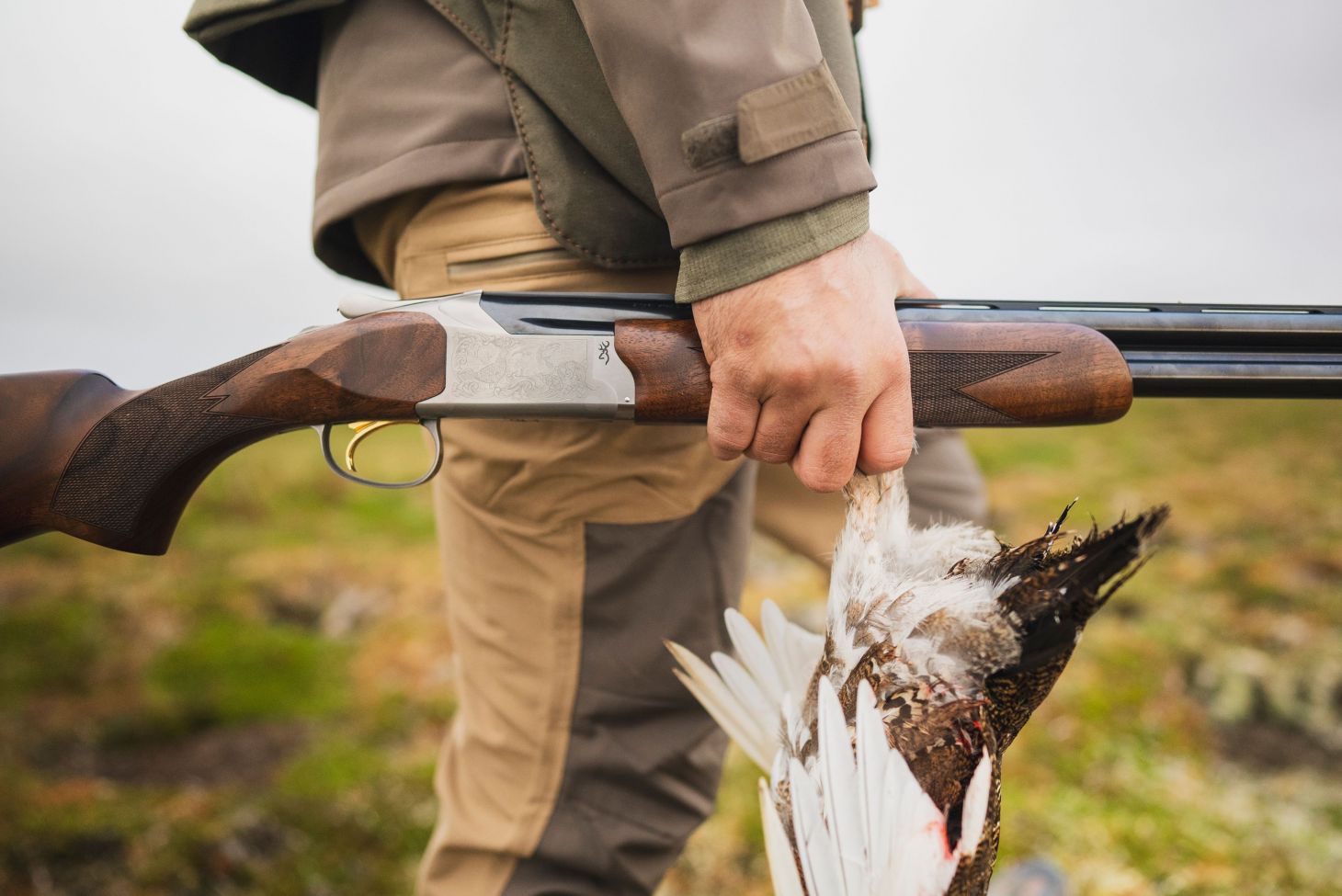 A ptarmigan hunter carries the new Browning Citori 825 shotgun. 